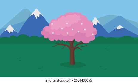 sakura tree against the backdrop of mountains