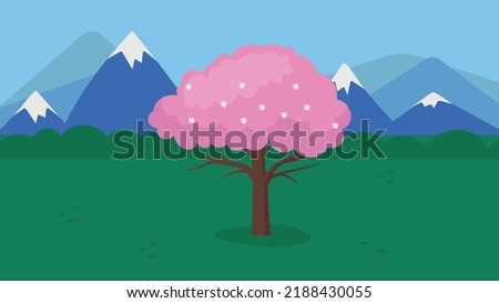 sakura tree against the backdrop of mountains