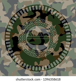 salad icon inside camouflaged emblem