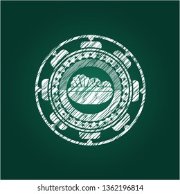 salad icon inside chalk emblem written on a blackboard