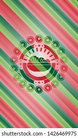 salad icon inside christmas style badge..