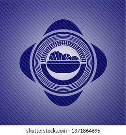 salad icon inside emblem with denim texture