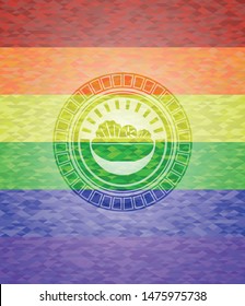 salad icon inside emblem on mosaic background with the colors of the LGBT flag