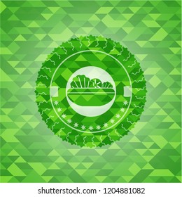 salad icon inside green emblem with mosaic background