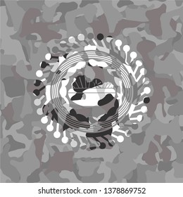 salad icon inside grey camouflaged emblem