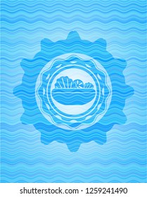 salad icon inside light blue water badge.