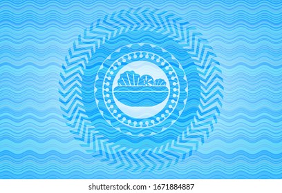 salad icon inside light blue water wave badge background.