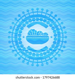 salad icon inside light blue water wave style emblem. 