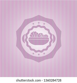 salad icon inside pink emblem