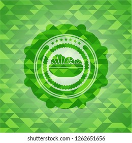 salad icon inside realistic green mosaic emblem