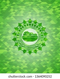 salad icon inside realistic green mosaic emblem