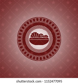 salad icon inside red emblem