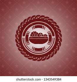salad icon inside red icon or emblem