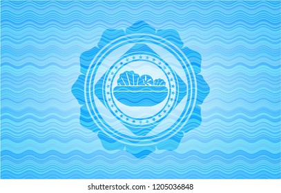 salad icon inside sky blue water wave emblem background.