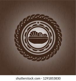 salad icon inside wood emblem