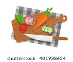 Salad ingredients on cutting board with knife. 