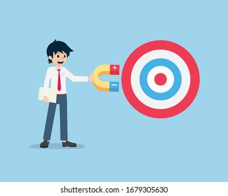 Salary Man Hold a large magnet that is sucking a giant target. If having a good business plan is like attracting success.