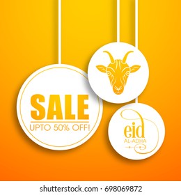 Sale card with discount offer and Arabic calligraphy of Eid Al Adha and goat face for the celebration of Muslim community festival.