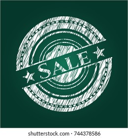 Sale chalkboard emblem written on a blackboard