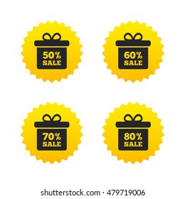 Sale gift box tag icons. Discount special offer symbols. 50%, 60%, 70% and 80% percent sale signs. Yellow stars labels with flat icons. Vector