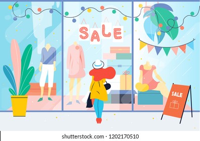 Sale. Girl looks at the clothes shop window. Woman standing near showcase in the mall. Discount