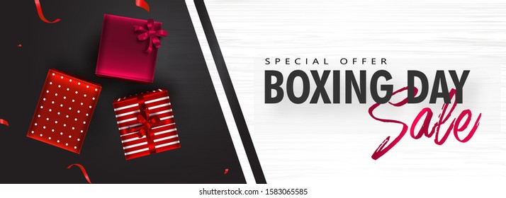 Sale header or banner design with top view of gift boxes on black and white texture background for Boxing Day.