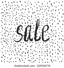 Sale lettering against the background of a point. Hand drawn graphics. 