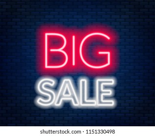 Sale neon lettering on brick wall background.