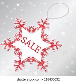 sale on snowflake on silver background