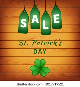 Sale poster of Saint Patrick's day with shamrock on wooden background and hanging green tags. Vector illustration