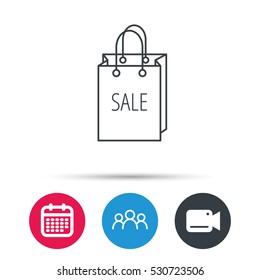 Sale shopping bag icon. Discount handbag sign. Group of people, video cam and calendar icons. Vector
