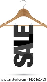 Sale sign on a wooden hanger