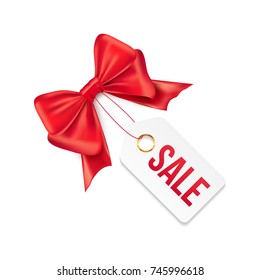 Sale tag with red gift bow. Vector sale paper label illustration for christmas discount promotion