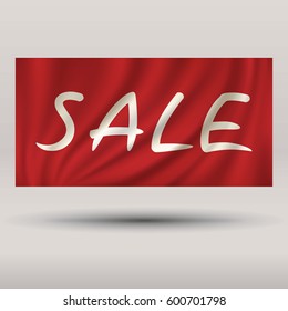 Sale white text on red silk background. Banner for shopping mall