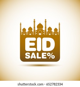 Sales card of Eid Mubarak with intricate calligraphy and mosque for the celebration of Muslim community festival.