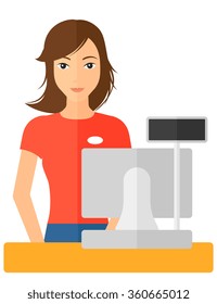 Saleslady standing at checkout.