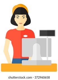 Saleslady standing at checkout.
