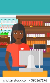 Saleslady standing at checkout.