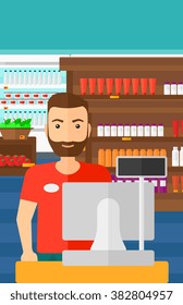 Salesman standing  at checkout.
