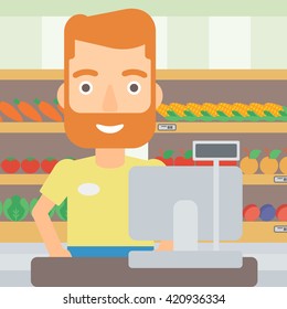 Salesman standing  at checkout.