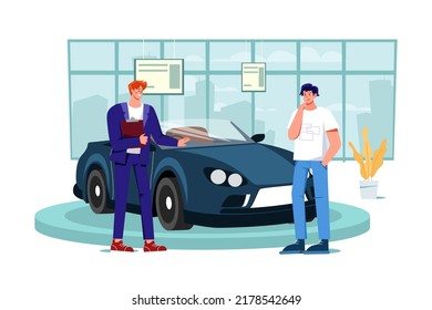 Salesperson showing the vehicle to a potential customer in the dealership