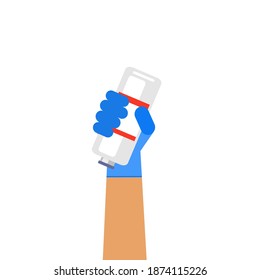 The saline bottle held by hand of healthcare provider.