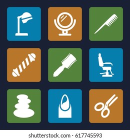 Salon icons set. set of 9 salon filled icons such as comb, mirror, hair brush, salon hair dryer, barber chair, spa stones, hair curler, nail
