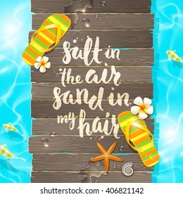 Salt in the air, sand in my hair - handwritten quote calligraphy, tropical flowers frangipani, starfish and flip-flops on a wooden old gangway.