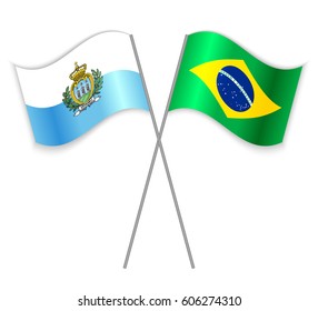 Sammarinese and Brazilian crossed flags. San Marino combined with Brazil isolated on white. Language learning, international business or travel concept.
