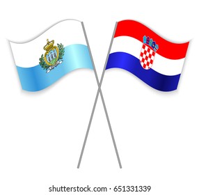 Sammarinese and Croatian crossed flags. San Marino combined with Croatia isolated on white. Language learning, international business or travel concept.