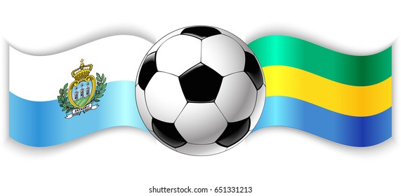 Sammarinese and Gabonese wavy flags with football ball. San Marino combined with Gabon isolated on white. Football match or international sport competition concept.