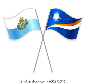 Sammarinese and Marshallese crossed flags. San Marino combined with Marshall Islands isolated on white. Language learning, international business or travel concept.