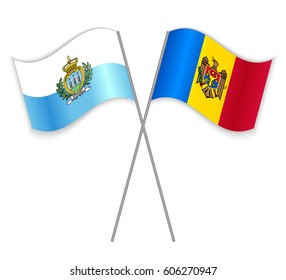 Sammarinese and Moldovan crossed flags. San Marino combined with Moldova isolated on white. Language learning, international business or travel concept.