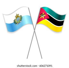 Sammarinese and Mozambican crossed flags. San Marino combined with Mozambique isolated on white. Language learning, international business or travel concept.